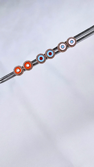 Enamel eye earring